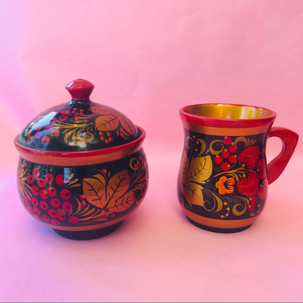 Vintage colorful Khokhloma wooden cup and bowl